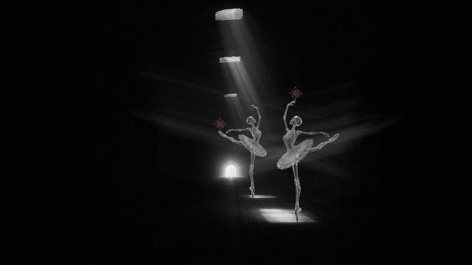 Two ballerinas perform a classical pose on pointe under a dramatic spotlight in a dark theater, with one holding a small bouquet.