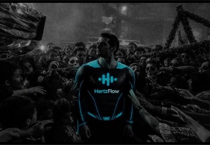 A dark promotional image showing a man wearing a black and cyan HertzFlow athletic compression shirt, standing in a crowd of people with skeleton face paint (Day of the Dead style).