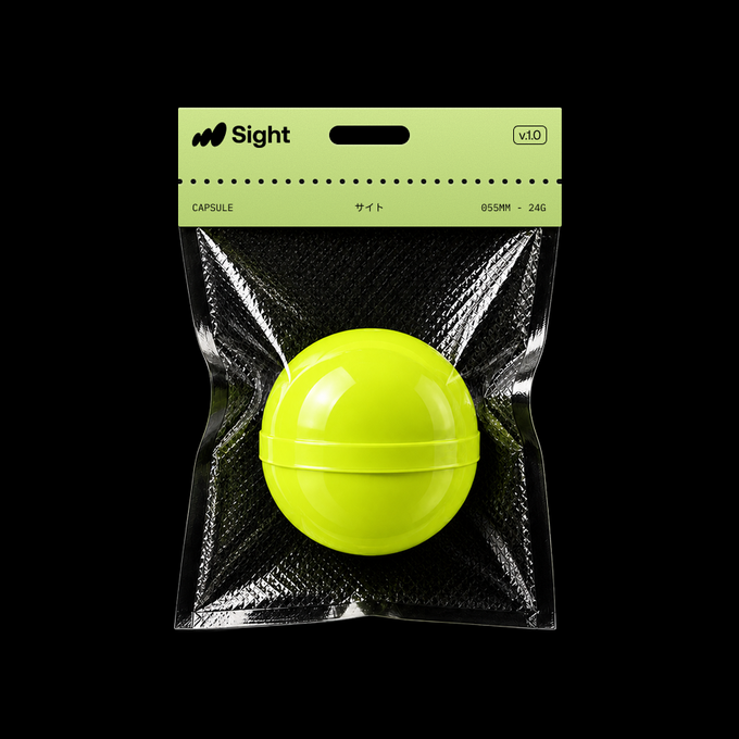 A dark, neon-green product pouch features a yellow card header reading 'Sight', 'CAPSULE', and 'v.1.0', displaying a bright yellow spherical capsule inside.