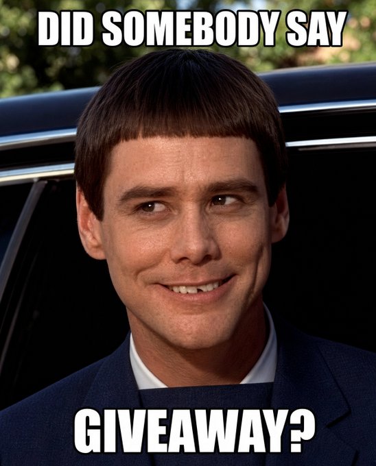 The meme shows Jim Carrey as Lloyd Christmas from "Dumb and Dumber" with his signature bowl haircut and an eager smile, captioned "DID SOMEBODY SAY GIVEAWAY?" — humorously expressing excitement about the post's announcement of Kalshi's $500 giveaway. The character's classic eagerness to the word "giveaway" perfectly matches the promotional tone of the trading platform's offer.