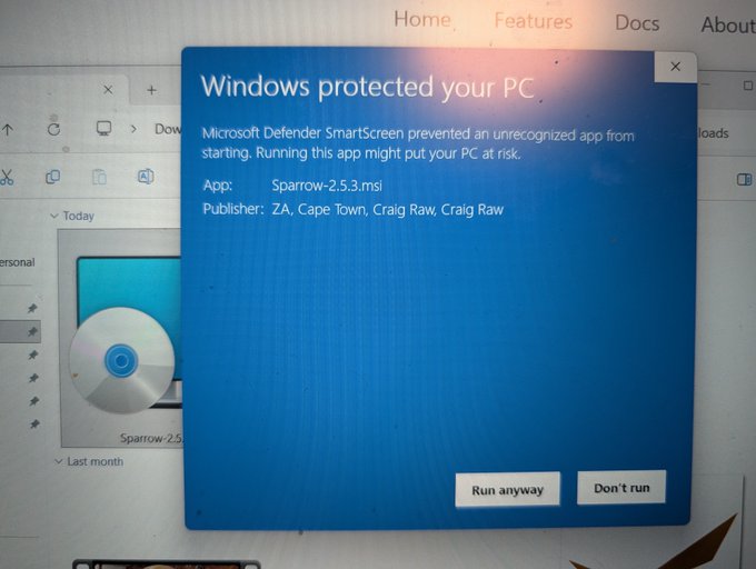 A Windows security warning dialog appears on screen stating 'Windows protected your PC' because Microsoft Defender SmartScreen prevented an unrecognized app named 'Sparrow-2.5.3.msi' from running.