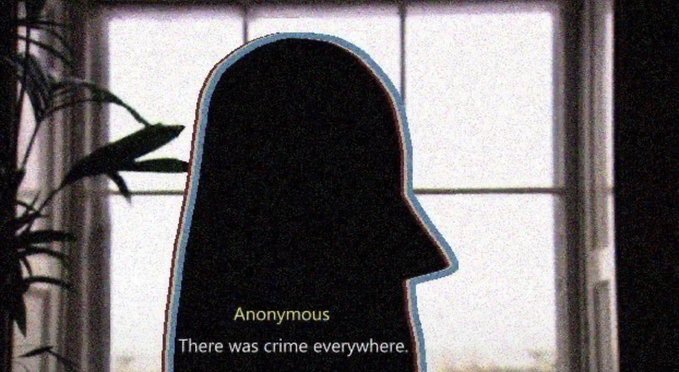 A silhouette of an anonymous person with text 'Anonymous - There was crime everywhere' displayed at the bottom.