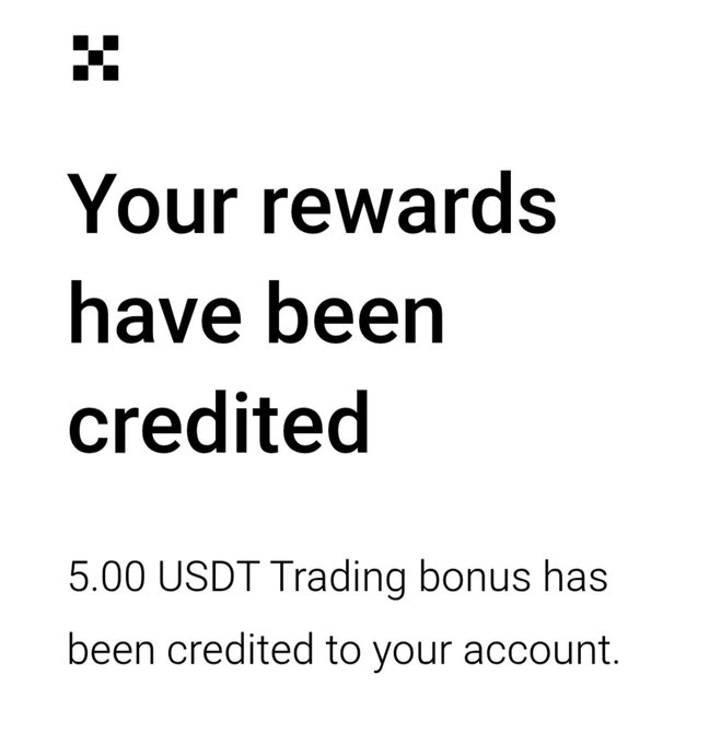 A white notification screen with black text stating "Your rewards have been credited" and "5.00 USDT Trading bonus has been credited to your account."