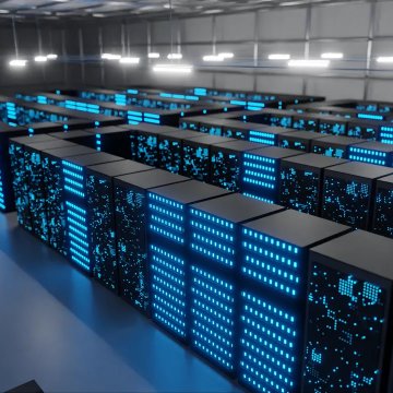 A vast data center floor filled with rows of black server racks glowing with bright blue indicator lights stretches into the distance under industrial ceiling lights. The image visually reinforces the post's message about the immense value of modern data centers, with each illuminated rack symbolizing the costly digital infrastructure that has outpaced traditional insurance markets and the $66 billion catastrophe-bond market in single-asset value.