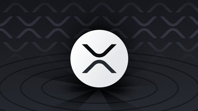 A circular white emblem featuring the stylized black "X" XRP logo is centered against a dark, textured background adorned with subtle wavy line patterns and concentric ripple-like rings, visually reinforcing the post's discussion of Ripple's native ledger trading account decline and rising volume.