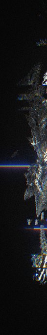 A dark, glitchy digital image with horizontal color distortion lines and fragmented pixelated shapes resembling a corrupted or distorted figure.