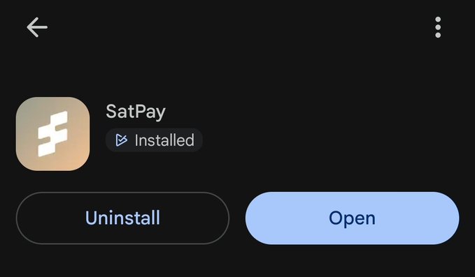 The image shows a phone screen displaying an app called SatPay installed on it. The app has been launched, and there are two buttons available - one for removing the app or leaving it open. The main focus of the image is the app itself, which appears to be related to cryptocurrency payments.