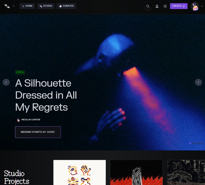 The image shows a website called Studio Projects, which features an art gallery with various images of people dressed in different styles. The main focus of the image is a person wearing a blue dress that has a spotlight shining on them, creating a dramatic effect. The background color of the image is dark and purple, adding to the overall atmosphere of the scene.