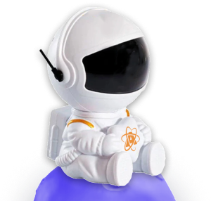 A small white astronaut figurine with a black visor and antenna, wearing a suit with an orange atom logo, sitting on a purple base.