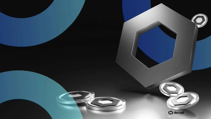 A 3D-rendered image showing a large metallic hexagonal nut with smaller hexagonal cryptocurrency tokens scattered around it on a dark surface, branded with the decrypt logo.