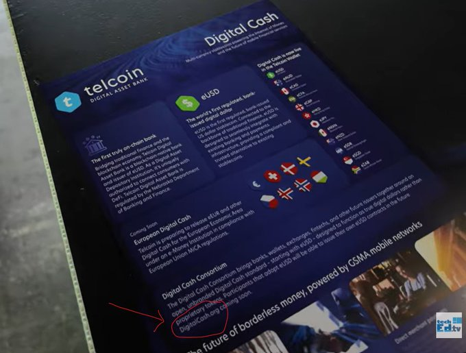 A close-up of a Telcoin 'Digital Cash' brochure detailing their tokenized eUSD offering, with a red arrow pointing to their tokenization token 'DigitalCash.org'.