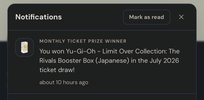 A notification from DYLI announces the user as a "Monthly Ticket Prize Winner," having won a Yu-Gi-Oh – Limit Over Collection: The Rivals Booster Box (Japanese) in the July 2026 ticket draw, received about 10 hours ago. The caption highlights the excitement of winning the platform's monthly free giveaway, which aligns with the accompanying post celebrating the win and promoting DYLI's ticket-based rewards system.