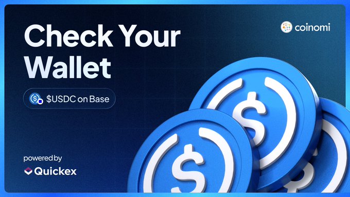 The image features a poster or advertisement promoting a wallet service called Coinomi. The main focus of the image is two blue coins with white dollar signs, which are placed on top of each other. Below these coins, there's text that reads "Check Your Wallet" and "USDC on Base". This suggests that the wallet service allows users to easily check their balances or transactions using USDC as a form of payment. The image also includes a link to the Coinomi website for more information about the wallet service.