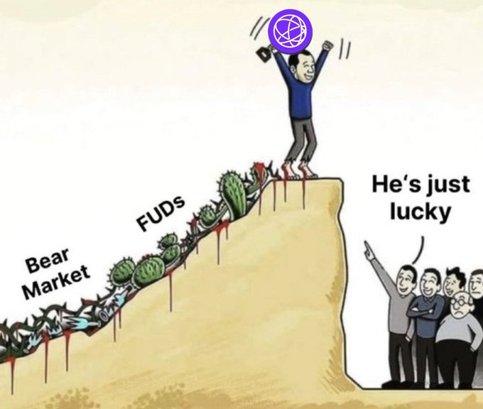 A cartoon shows a triumphant crypto investor at the top of a cliff holding a coin, having climbed past bloodied cacti labeled "FUDs" and "Bear Market," while onlookers below dismiss his success with "He's just lucky." The image mirrors the poster's defiant stance against $TIA skeptics, illustrating how perseverance through negativity and doubt can lead to victory while critics attribute success to mere luck.
