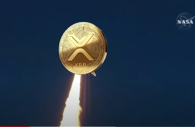 A digital rendering of a gold XRP cryptocurrency coin launching like a rocket with NASA branding in the corner, symbolizing the post's discussion of XRP's unrealistic price projections and its already substantial market capitalization approaching $100 billion.