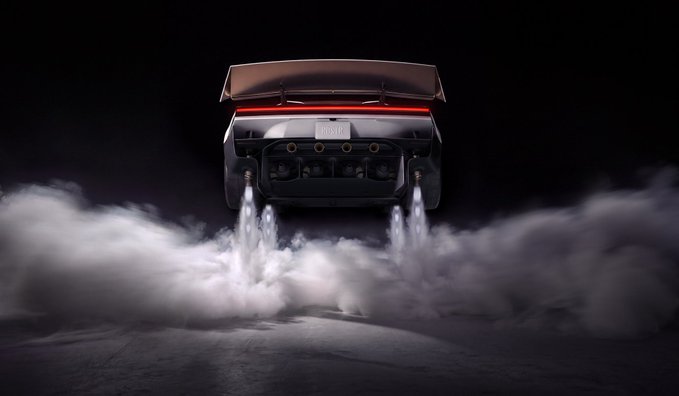 A dramatic shot of a hypercar's rear end with thrusters firing, enveloped in smoke against a dark background.