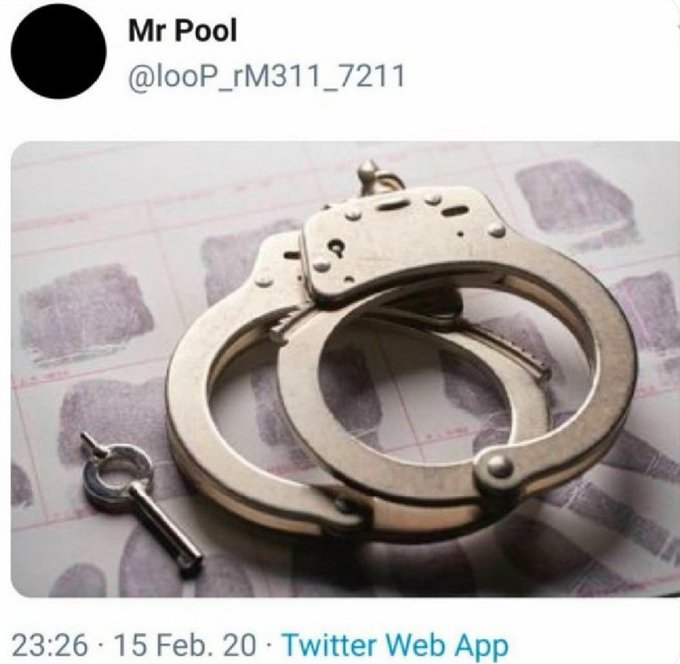 A tweet from Mr Pool (@looP_rM311_7211) dated 15 Feb. 20 showing a photo of metal handcuffs on a background of fingerprint cards.