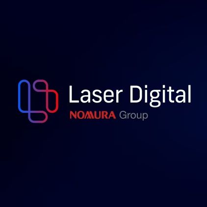 The image displays the Laser Digital logo, a Nomura Group company, featuring a stylized blue and red "LD" emblem alongside the company name on a dark navy background. The logo relates to the announcement that Nomura-backed Laser Digital has been approved as Japan's first new crypto exchange service provider in four years, set to provide liquidity and institutional crypto trading services in the country.