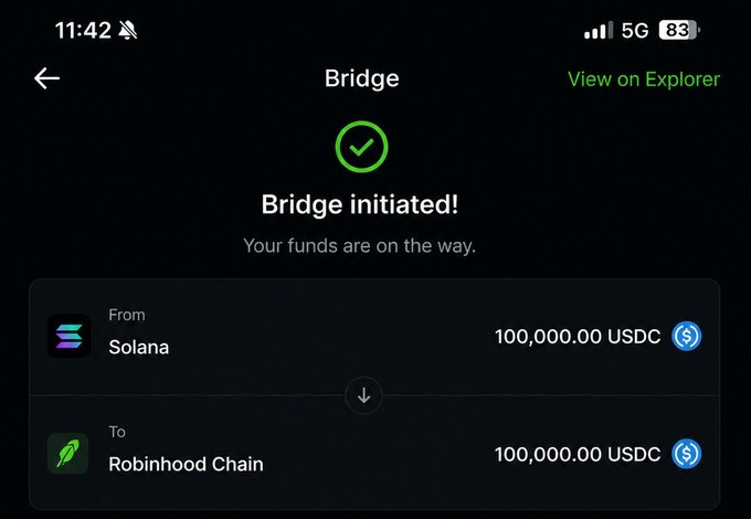 A screenshot shows a successful bridge transaction of 100,000 USDC from Solana to Robinhood Chain, with a green checkmark and "Bridge initiated!" confirmation. This aligns with the post's message of moving a substantial portfolio off Solana, with the large six-figure transfer visually emphasizing the seriousness of the user's departure from the Solana ecosystem.