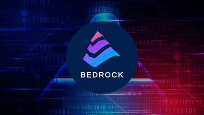The image features a logo for Bedrock, which is a protocol designed to enable Bitcoin, Ethereum, up to IoTeX to be "staked" while remaining liquid. The logo consists of a blue triangle with purple lines inside, surrounded by a circle filled with numbers and letters in various colors. The text on the image reads: "Bedrock is a protocol that enables Bitcoin, Ethereum, up to IoTeX to be 
staked", indicating that this is an advertisement for Bedrock's innovative approach to cryptocurrency trading.