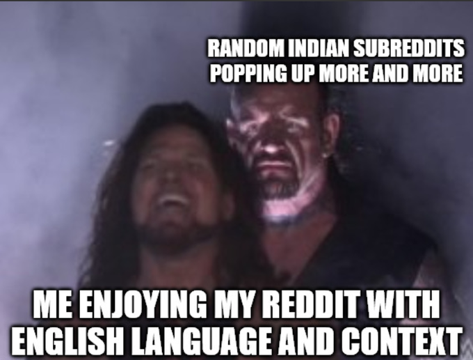 A meme featuring two characters with the text "RANDOM INDIAN SUBREDDITS POPPING UP MORE AND MORE" on top and "ME ENJOYING MY REDDIT WITH ENGLISH LANGUAGE AND CONTEXT" on the bottom.