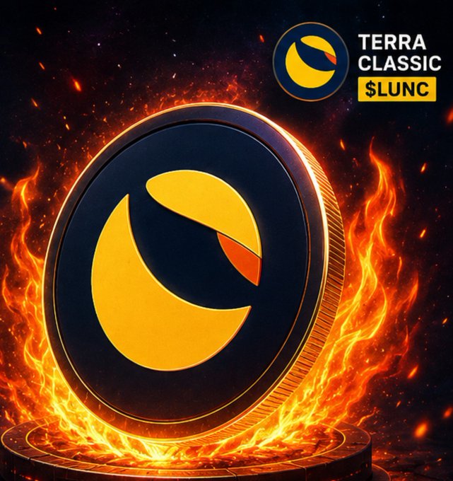 A Terra Classic ($LUNC) cryptocurrency coin engulfed in flames, with its logo in the upper right corner.