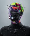 A dark figure has a colorful, paint-splattered head covered with vibrant graffiti-like markings, with no visible text or numbers in the image. The chaotic, abstract head visually represents the "imaginary figures" flying in the mind of someone optimistically visualizing a $100,000 Bitcoin price milestone.