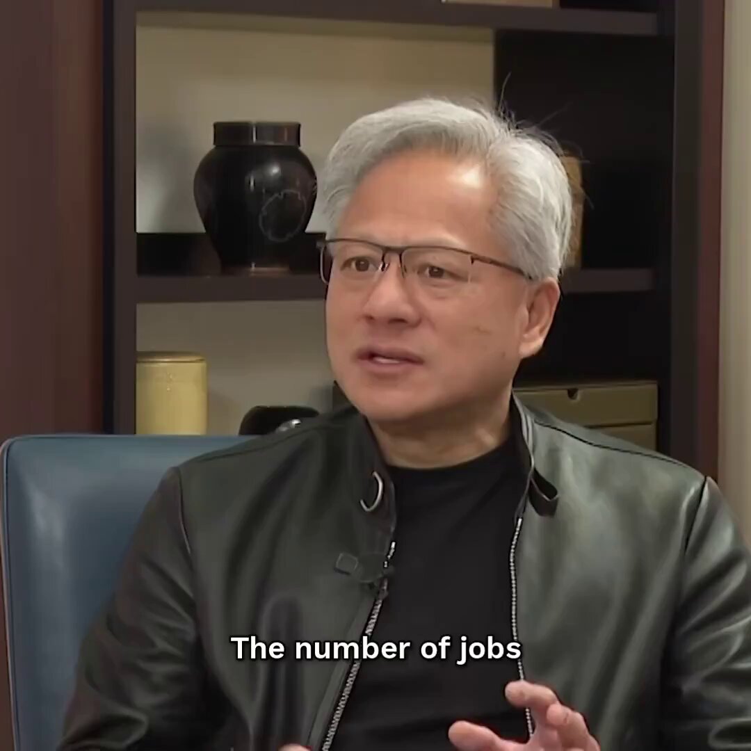 The image features a man wearing glasses sitting in a chair with his hands together as he speaks. The text "THE NUMBER OF JOB" can be seen, which might be related to the discussion about AI or technology jobs.