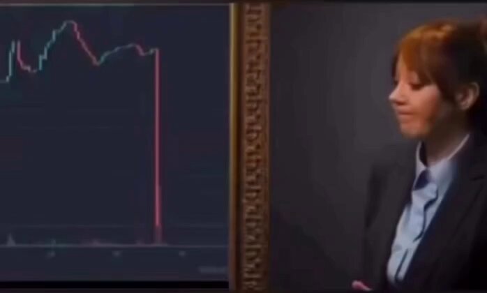 The image features a woman wearing a blue dress who appears to be showing off a gold framed painting of a stock chart behind her, with a price line indicating a significant drop. She seems to have just demonstrated how an economic decline may affect someone's purchasing power or even their entire life savings. In the caption at the bottom of the image, it reads "POV: You just convinced your friend to buy a token". This sentence emphasizes that she has managed to sway the opinion or decision of her companion in this context. The phrase "POV" stands for 'Public Opinion' and indicates that these events may be shared with others through media or discussions.