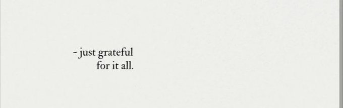 A minimalist image with simple text on a white background reading '~just grateful for it all.'