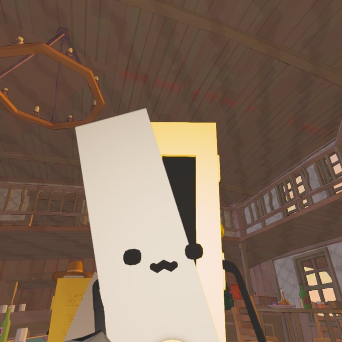 A low-polygon video game character with a large, white, wedge-shaped head and simple black dot eyes stands in a wooden, two-story cabin interior featuring a chandelier and a painting.