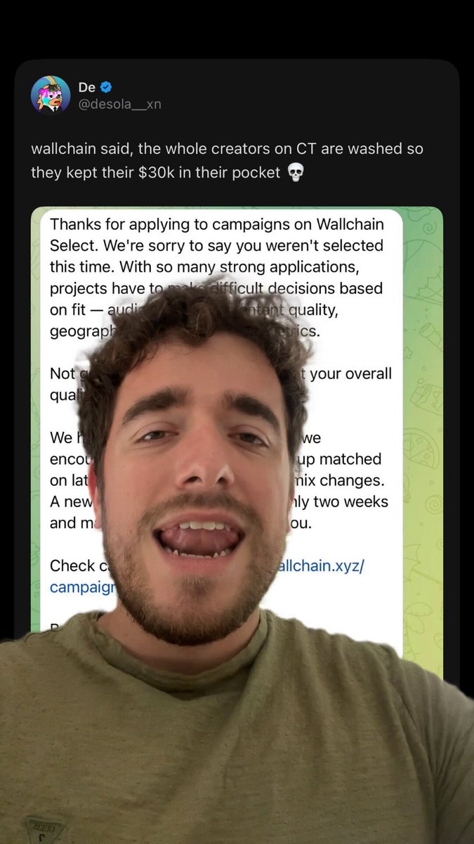The image shows a man with a beard wearing a green shirt, who appears to be making a funny face or laughing at something. The caption of the image includes some text that seems to be related to Wallchain bullshit or a humorous statement about the current situation.