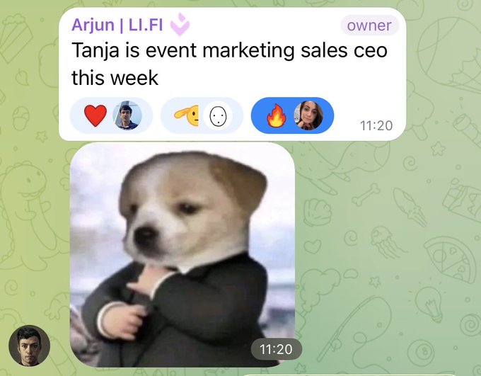 A group chat screenshot from "Arjun | LI.FI" with text "Tanja is event marketing sales ceo this week" above a meme of a dog in a suit.