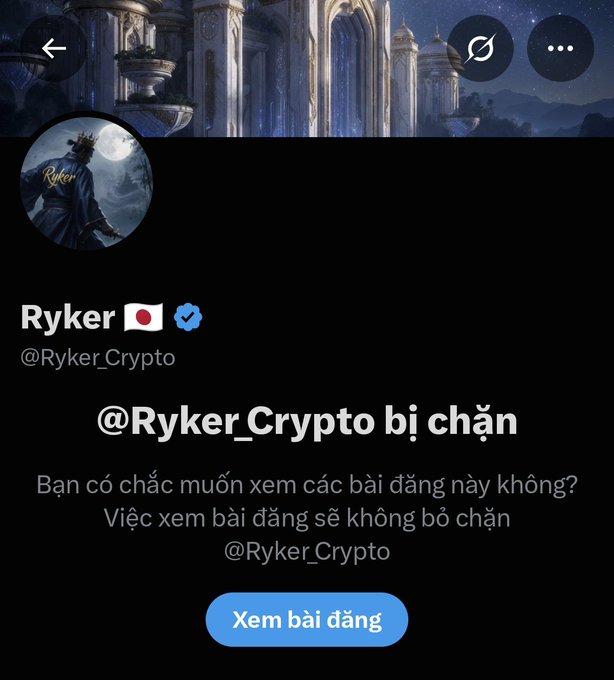A Twitter/X screenshot showing that user @Ryker_Crypto has blocked the viewer, displaying a Vietnamese message asking "Are you sure you want to view these posts? Viewing posts will not unblock @Ryker_Crypto," along with the caption noting that "my idol is getting trashed with FUD left and right," referencing the blocked Ryker_Crypto account.