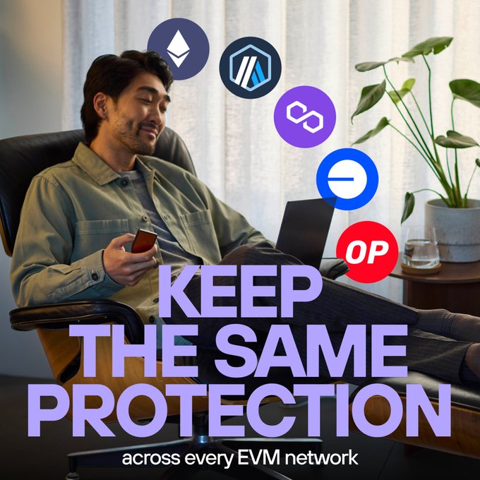 An advertisement showing a relaxed man in a chair holding a phone, surrounded by crypto logos (Ethereum, Arbitrum, Polygon, Base, Optimism) with text reading 'KEEP THE SAME PROTECTION across every EVM network.'