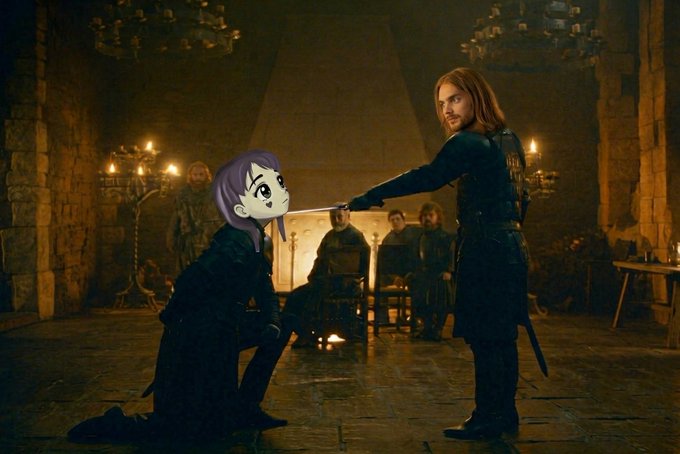 A fantasy movie scene of a long-haired warrior holding a blade to a kneeling purple-haired figure in a candlelit stone hall, with onlookers in the background.