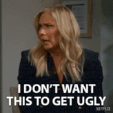 The image features a woman with blonde hair wearing a black blazer who appears to be looking at something or someone off-camera. Below her head, there's text that reads "I DON'T WANT THIS TO GET UGLY". The caption also mentions that this is related to the post about the TV show "NETFLIX", which could imply that they are discussing a character from the series who has blonde hair and is wearing a black blazer.