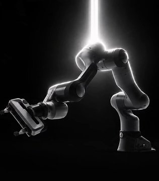 A robotic arm is silhouetted against a dark background, illuminated from above by a beam of light. The image evokes themes of advanced technology and automation, fitting for a post about Axis Robotics' ($AXIS) upcoming TGE on October 21.