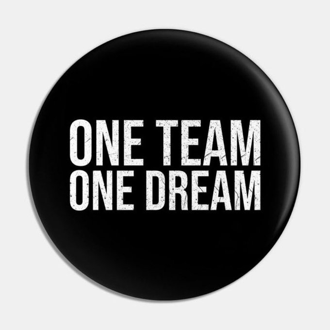The image features a black circle with white text that reads "One Team One Dream", which appears to be a logo or design for an organization, possibly related to cryptocurrency or financial services. The text is written in all capital letters, making it stand out against the black background of the circle.