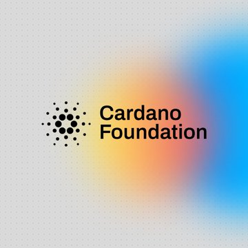 The image displays the Cardano Foundation logo—a cluster of black dots forming a circular emblem beside the text "Cardano Foundation"—set against a soft gradient background blending white, warm orange, and blue tones. This visual reinforces the post's message about anchoring green food proof on the Cardano blockchain, highlighting the Foundation's brand identity in the context of the EU's new sustainability claim regulations.