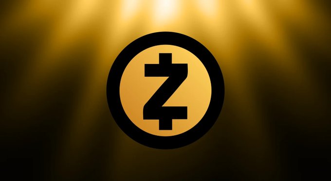 Gold Zcash (ZEC) cryptocurrency logo on a black background with golden light rays.