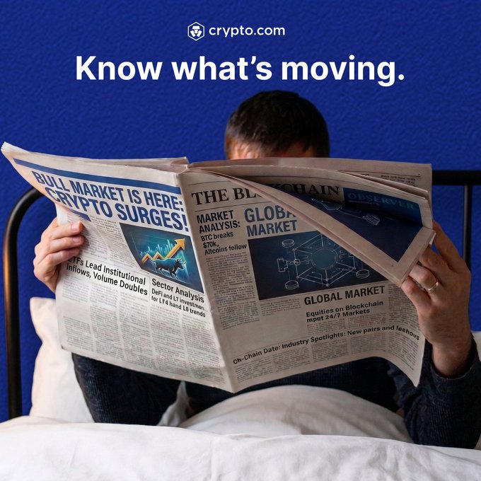A person in bed reads a newspaper featuring headlines like "BULL MARKET IS HERE: CRYPTO SURGES!" and "MARKET ANALYSIS: BTC breaks $70K," beneath the Crypto.com logo and tagline "Know what's moving." The image visually reinforces the post's message about filtering out noise to find meaningful market signals, suggesting Crypto.com's Insights tab delivers the essential crypto news without the overwhelming clutter of traditional financial coverage.