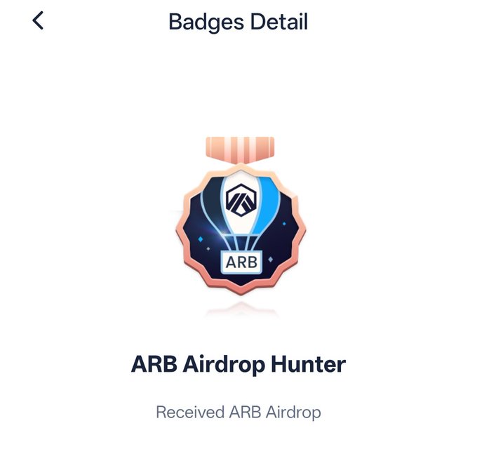 A digital badge interface showing 'Badges Detail' for the 'ARB Airdrop Hunter' medal, featuring a shield-shaped emblem with 'ARB' written on it, and the description 'Received ARB Airdrop'.