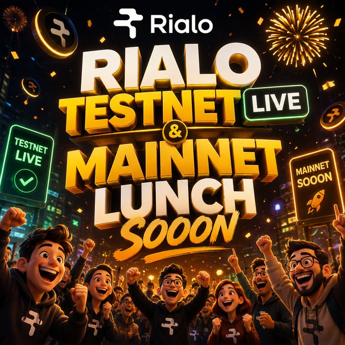 A vibrant promotional graphic for "Rialo" announces "RIALO TESTNET LIVE & MAINNET LAUNCH SOON" in bold gold lettering, set against a festive cityscape with fireworks, Rialo coin icons, and a crowd of animated fans cheering. Smaller signs highlight "TESTNET LIVE" and "MAINNET SOON," reinforcing the celebratory buzz around the project's upcoming milestones.
