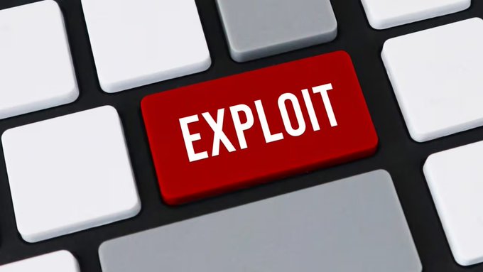 A close-up of a computer keyboard with a prominent red key labeled 'EXPLOIT' surrounded by white and grey keys.