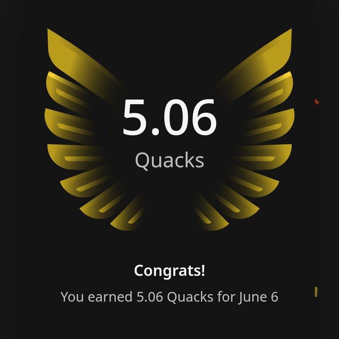 The image features a gold-colored logo with the text "Congratulations! You earned 5.06 Quacks for June 6" written below it. The main focus of the image is the golden eagle design that surrounds the text, which adds an artistic touch to the overall presentation.