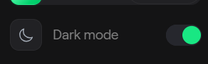 A smartphone UI toggle for 'Dark mode' shown in the enabled position with a green switch.