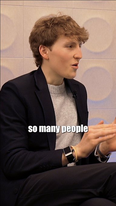 A man with curly hair wearing a dark blazer over a gray sweater gestures with his hands while speaking, with the text "so many people" overlaid on the image, illustrating the founder's point about obsessing over details others would overlook.