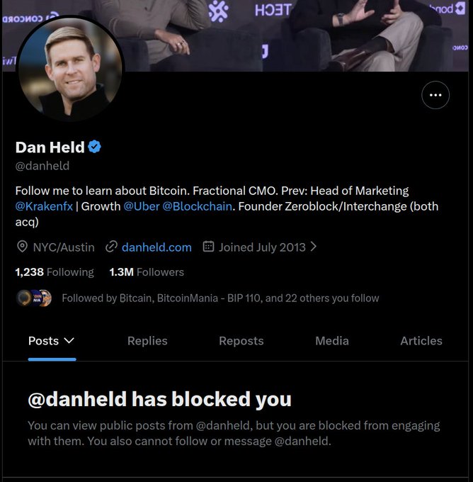 The image shows Dan Held's (@danheld) X/Twitter profile with 1.3M followers, displaying a message that "@danheld has blocked you," which visually illustrates the accompanying post's point that blocking is used as a tactic against KAS supporters, reflecting the "Maxi" fear mentioned.