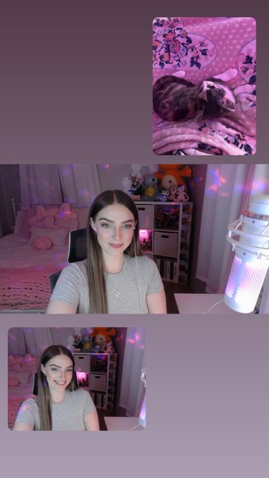 A video stream layout showing a young woman with long brown hair smiling in her pink-lit bedroom alongside a separate panel of a small dog sleeping on a pink patterned blanket.
